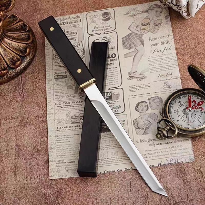 A small ebony knife is used to forge and cook lamb chops and steaks. The kitchen uses a knife to cut fruits and peel them by hand details Picture