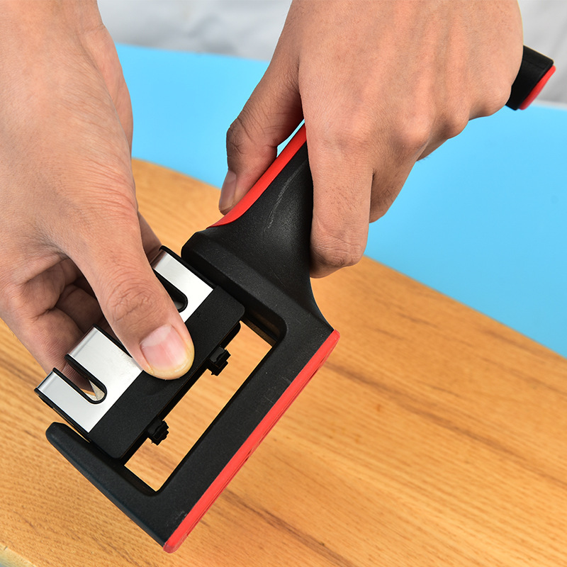 In-stock household quick knife sharpener, three-stage whetstone, multi-functional kitchen handheld stainless steel red and black knife sharpener Application Scenario