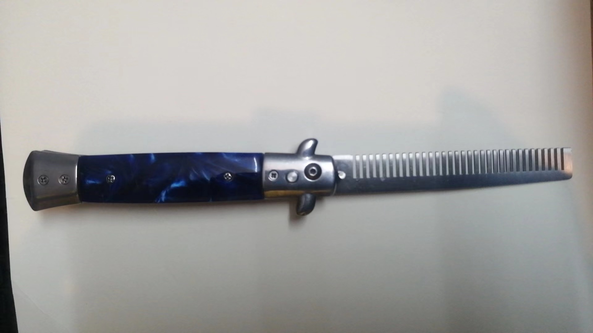 Comb practice knife, stainless steel ornamental knife, no sharp edge, portable, reversible and deformable outdoor equipment undefined
