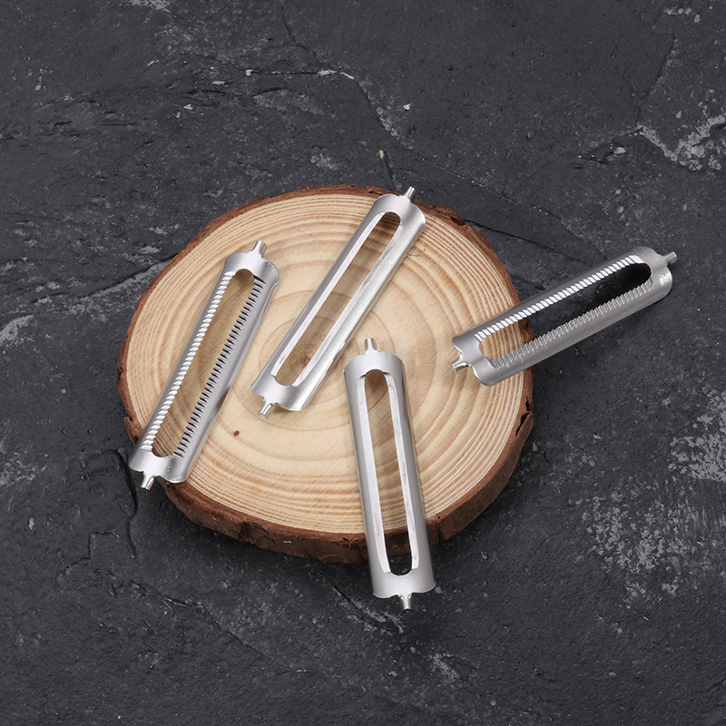 Stainless steel peeler, double-sided serrated grater blade, fruit and melon peel flat edge blade, double-sided peeling Specification drawing