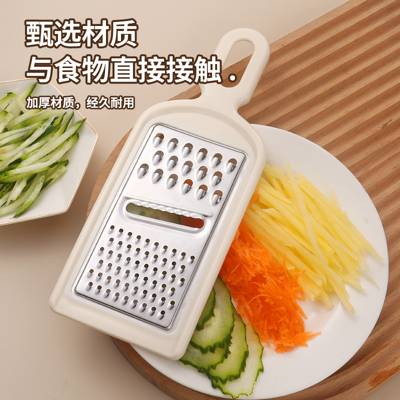 Multi-functional manual stainless steel vegetable slicer, household potato and fruit grater, creative kitchen small items Application Scenario