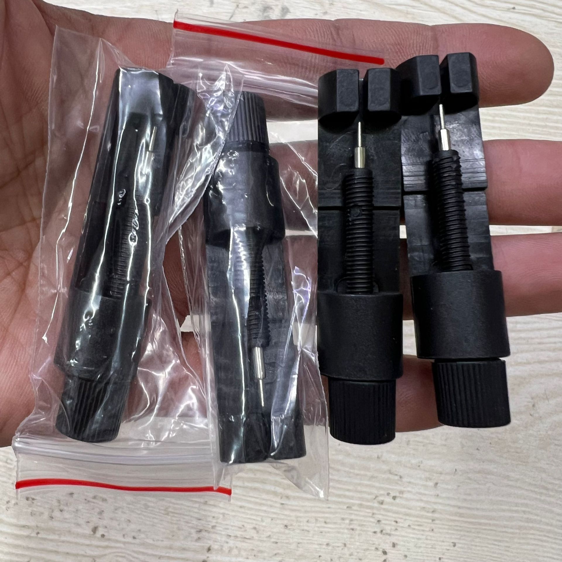 Watch adjuster, watch folding tool, watch length adjustment tool, watch strap remover, needle injector, wrist strap remover undefined