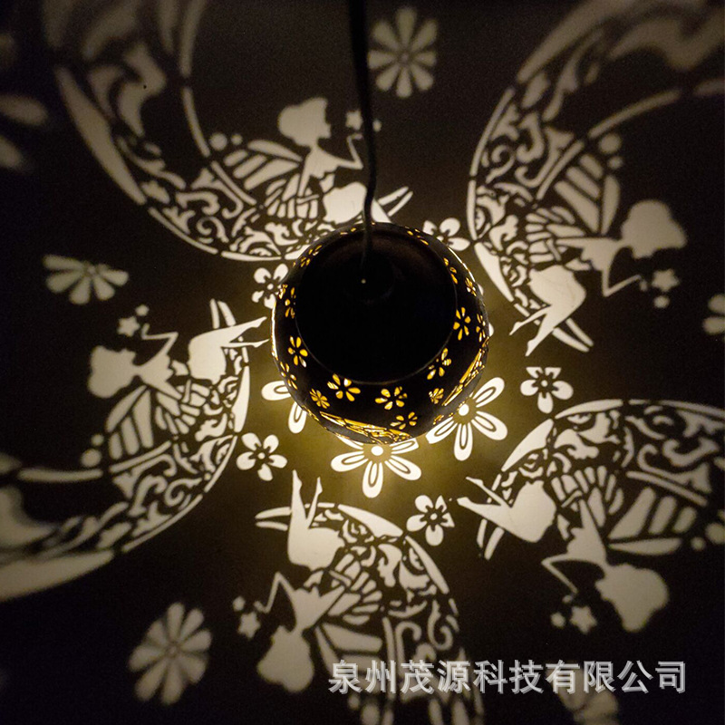 Ironwork waterproof solar lamps, water drop lamps, outdoor garden and courtyard landscape hollowed-out decorative projection lamps, lawn hanging lamps Application Scenario