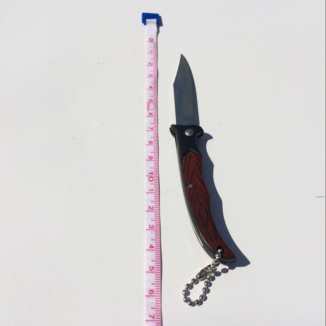 Wooden handle patterned folding knife, outdoor knife, daily necessities fruit knife, wholesale supply for one or two yuan, gift details Picture