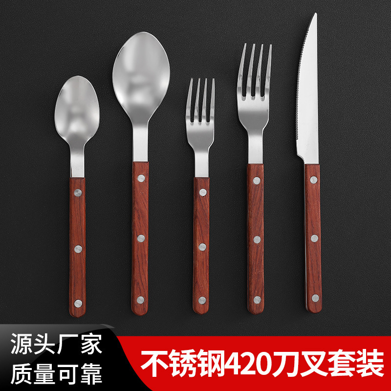 Stainless steel Western tableware with solid wood handles, steak knives, spoons, chopsticks, forks, dessert spoons, five-piece set of tableware details Picture