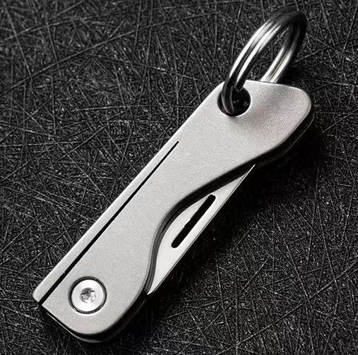 Titanium alloy mini folding knife, express delivery knife, portable edc keychain, self-defense pendant, letter opening knife, folding portable knife undefined