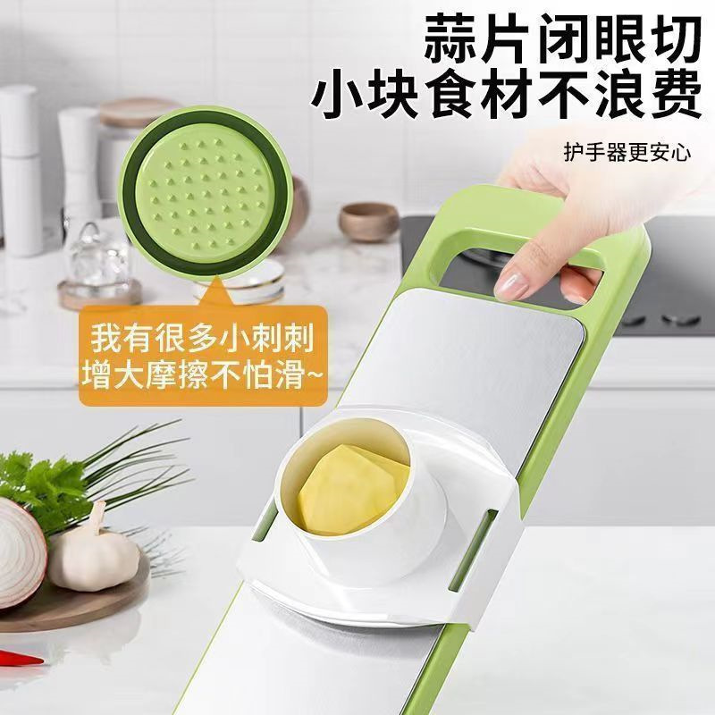 A new multi-functional household kitchen tool that won't hurt your hands, such as a vegetable slicer, potato shreder, and radish slicer Specification drawing