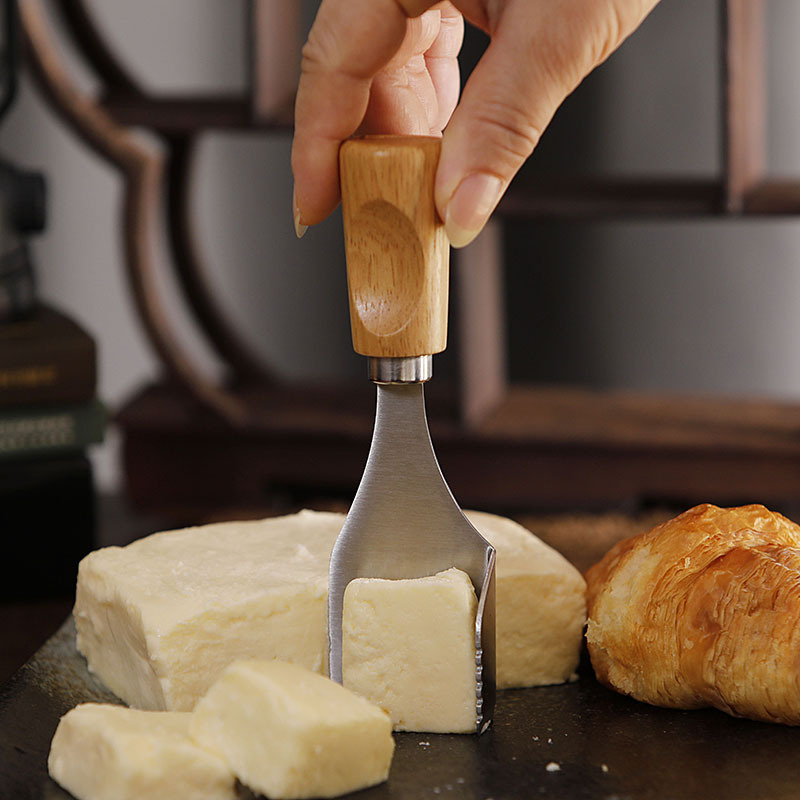 The factory's new rubber wooden-handled cheese and cheese cutter, stainless steel triangular butter and buttery cutter, right-angle spatula details Picture