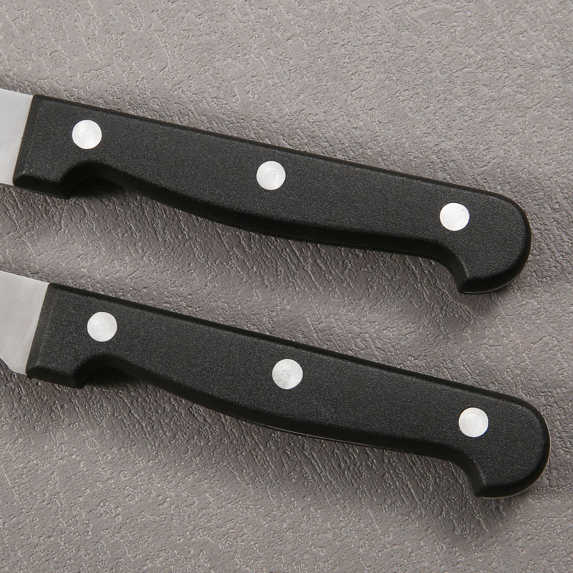A set of 2 pieces of stainless steel steak knife and black plastic handle steak knife for cross-border foreign trade in stock details Picture