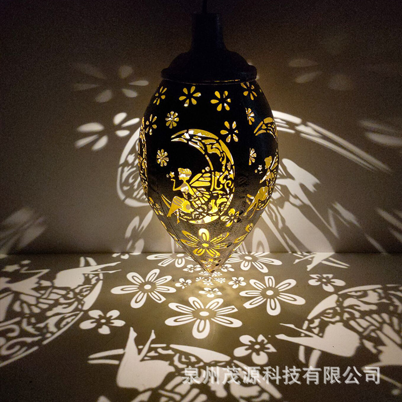 Ironwork waterproof solar lamps, water drop lamps, outdoor garden and courtyard landscape hollowed-out decorative projection lamps, lawn hanging lamps full figure