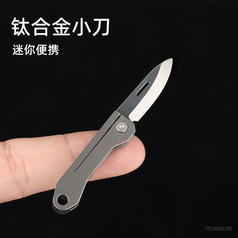 Titanium alloy mini folding knife, express delivery knife, portable edc keychain, self-defense pendant, letter opening knife, folding portable knife undefined