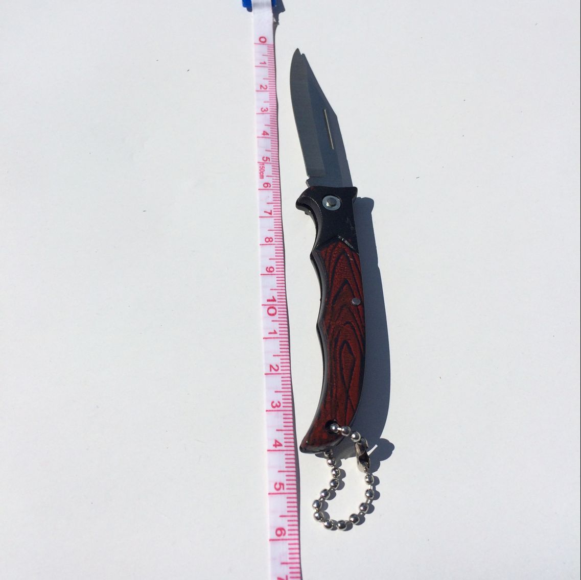 Wooden handle patterned folding knife, outdoor knife, daily necessities fruit knife, wholesale supply for one or two yuan, gift Specification drawing