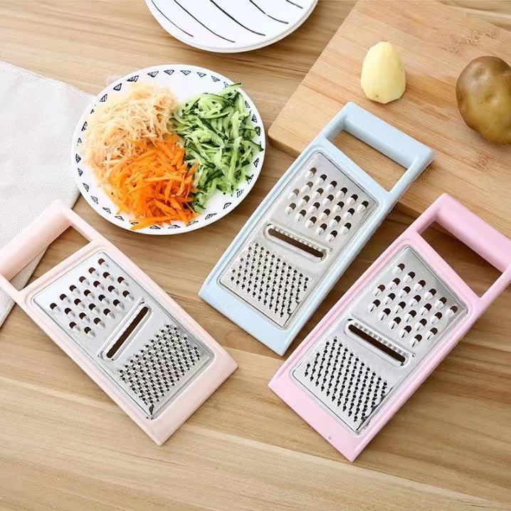 Multi-functional vegetable slicer, home kitchen potato slicer, cucumber slicer, grater, stainless steel grater. full figure