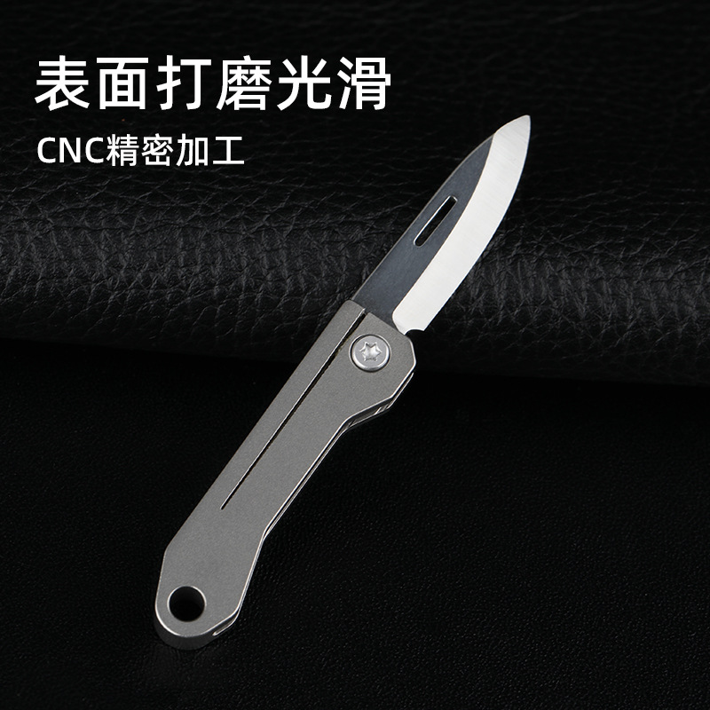 Titanium alloy mini folding knife, express delivery knife, portable edc keychain, self-defense pendant, letter opening knife, folding portable knife Application Scenario