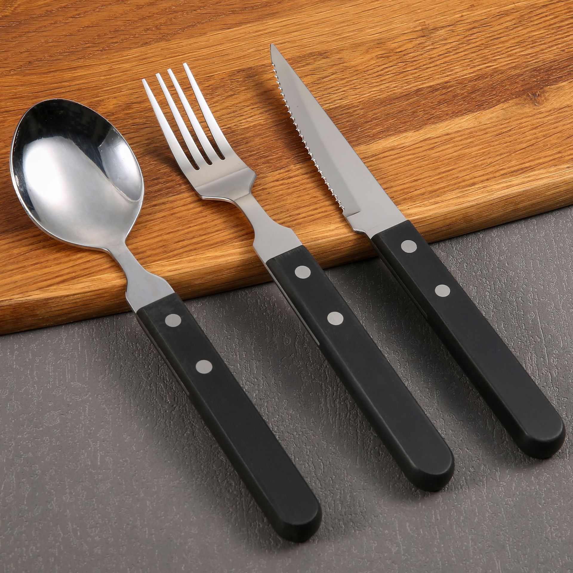New kitchen tableware, stainless steel steak and Western tableware, black plastic handle steak knife, fork and spoon 3-piece set full figure