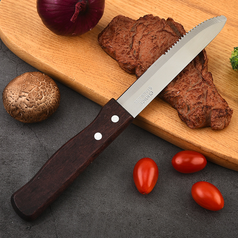 Factory wholesale stainless steel kitchenware and tableware, wooden handle serrated beef and mutton cutlet knives, household barbecue and bread knives, Western cuisine knives Application Scenario