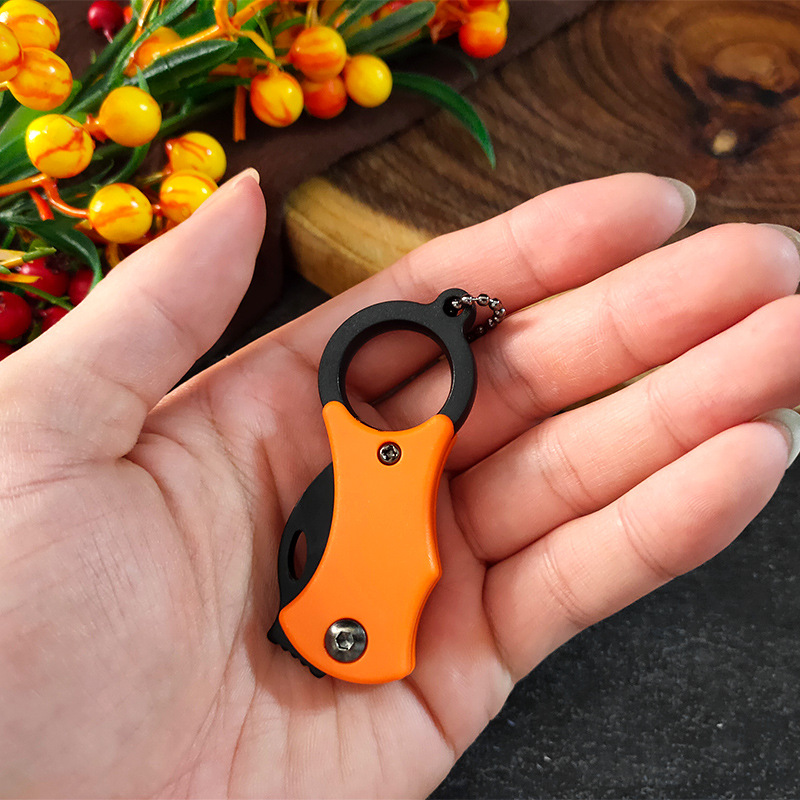 Mini knife, portable package opening knife, folding fruit knife, convenient key knife, household fruit and vegetable knife, peeler knife, eagle claw knife Application Scenario