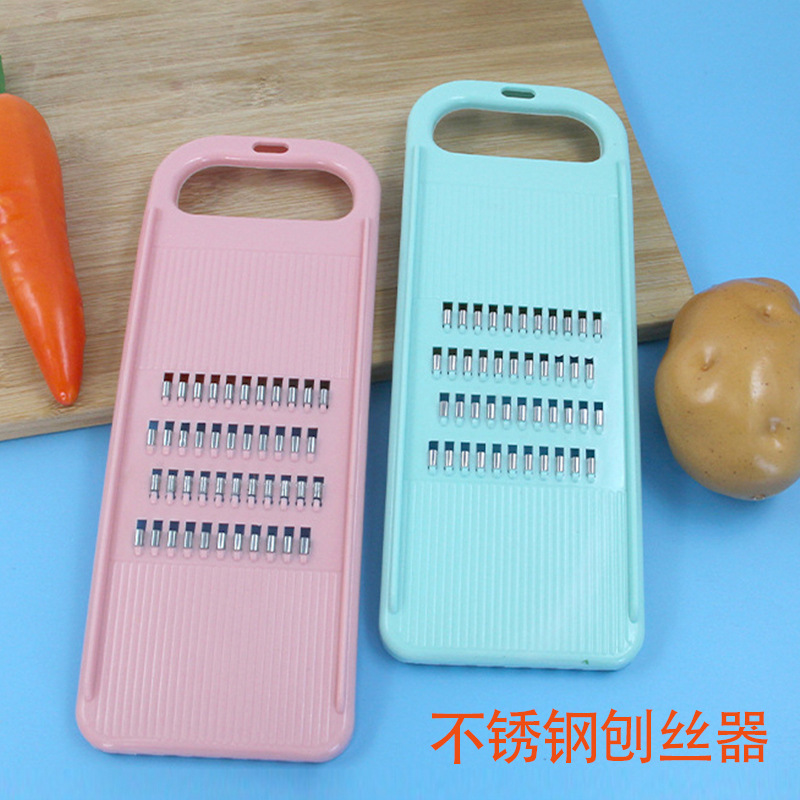 Wholesale of household multi-functional stainless steel vegetable and fruit grater, potato and carrot kitchen plastic grater full figure