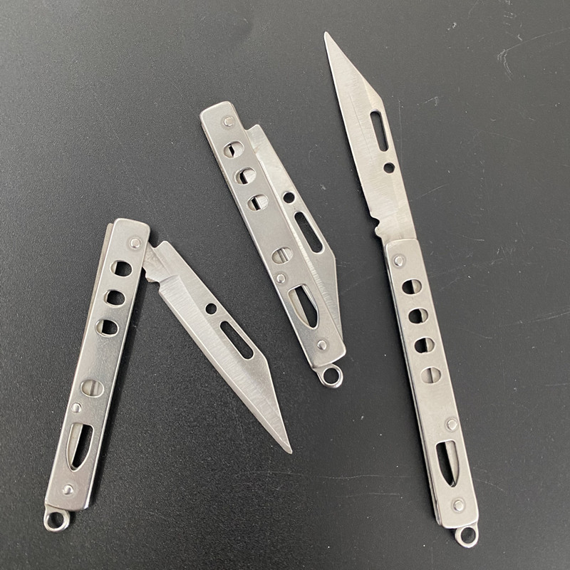 Foldable small steel knife with holes, portable knife, 1-yuan store, 2-yuan store wholesale supply Item Picture
