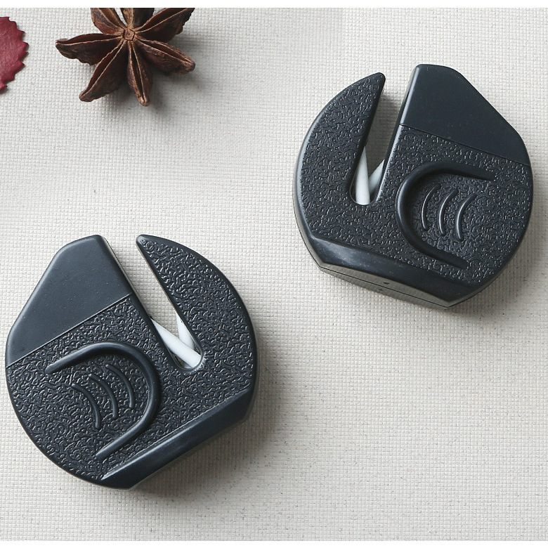 Portable knife sharpener, creative small grinding tool wholesale, new household knife sharpening wonder, welfare item whetstone Application Scenario