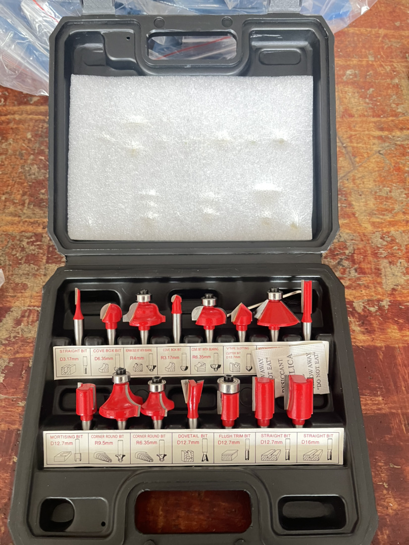 12-piece and 15-piece sets of 1/4 and 1/2 woodworking milling cutters, engraving machine lathes, bakelite edge trimming milling cutter sets undefined