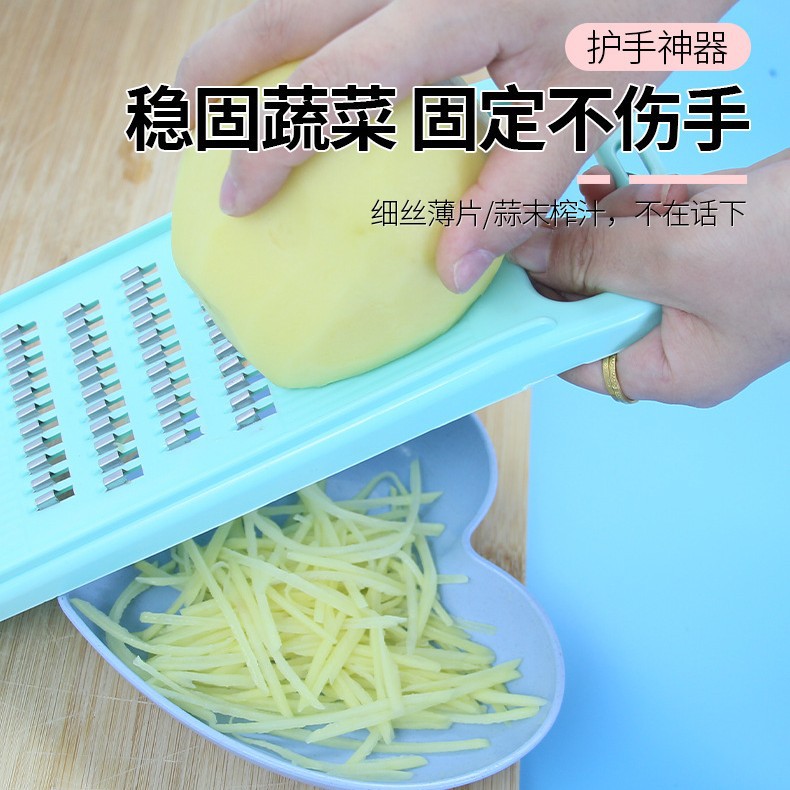 Wholesale of household multi-functional stainless steel vegetable and fruit grater, potato and carrot kitchen plastic grater Specification drawing