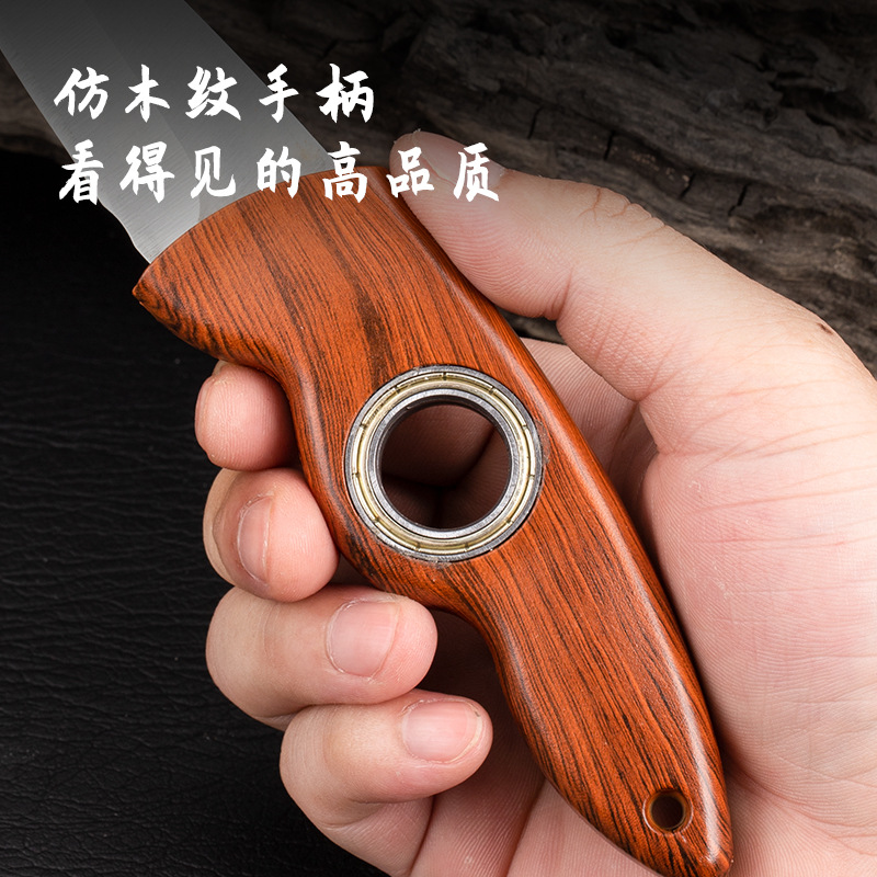 Bearing rotating knife, 360-degree rotating household fruit knife, outdoor hand-handled meat, portable sharp knife, popular online celebrity Specification drawing