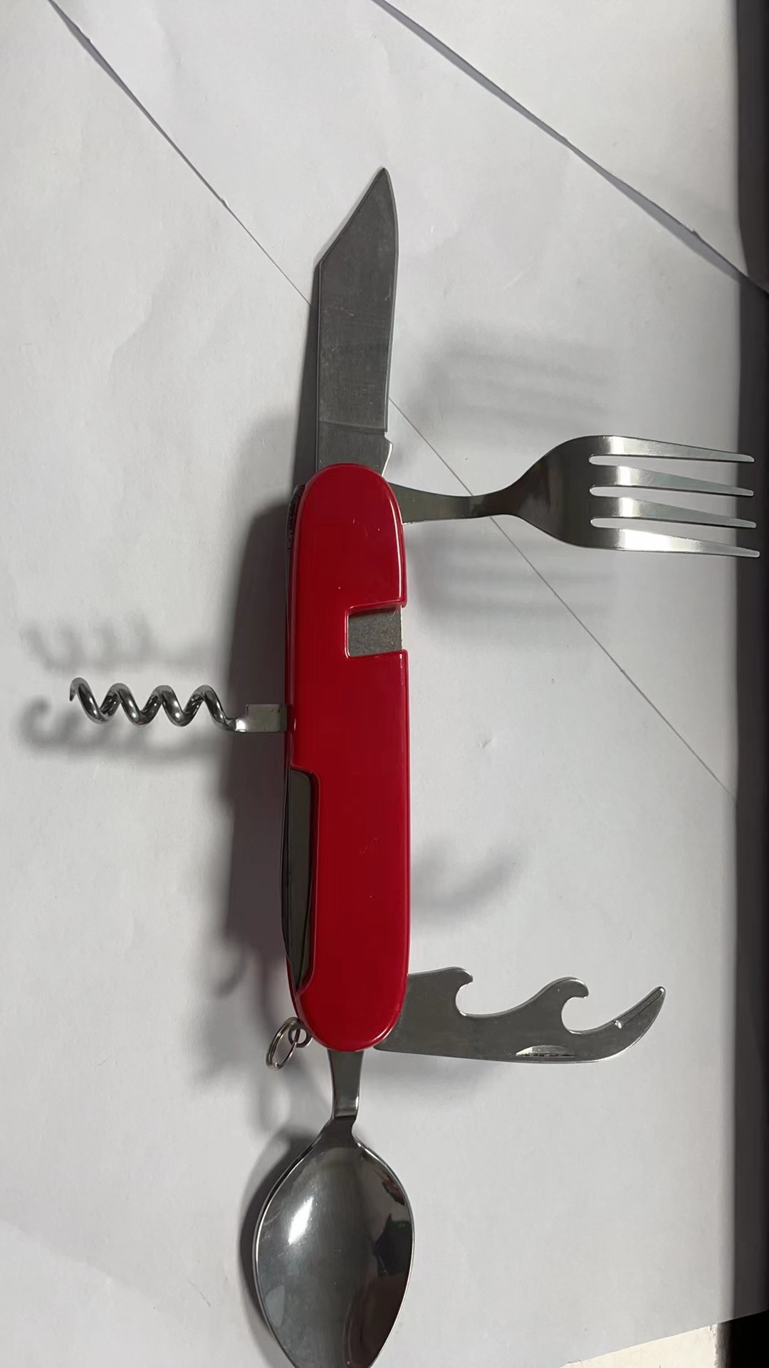 A variety of portable foldable and storable stainless steel knives, forks, spoons, outdoor multi-purpose camping tableware and creative picnic tools undefined
