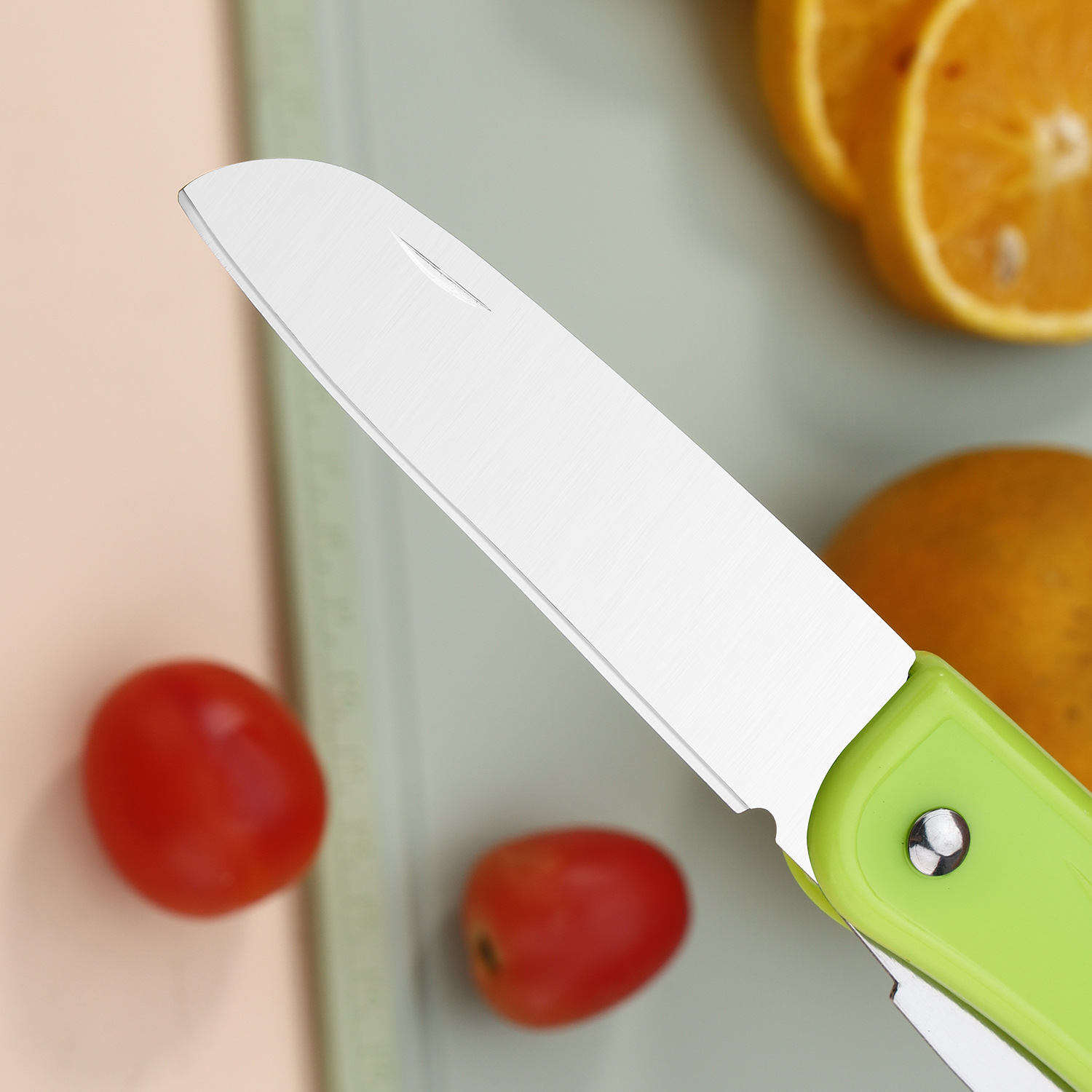 Stainless steel multi-functional fruit knife, household fruit peeler and scraper, portable candy-colored fruit knife, melon slicer Application Scenario
