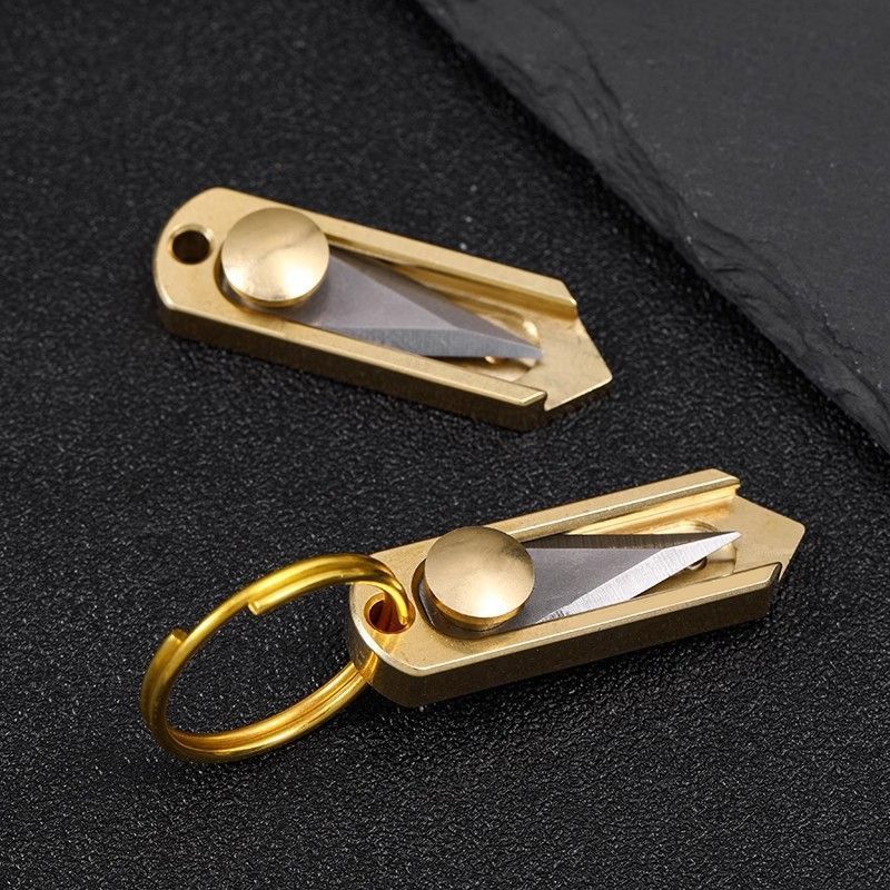 Portable keychain pendant, unpacking packages, opening boxes, small brass mini knife, sharp pocket, push-pull Application Scenario