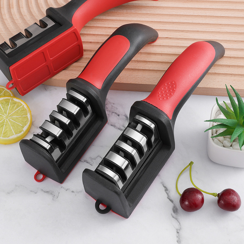 A household handheld quick whetstone, a new kitchen grinding tool, a multi-functional three-stage knife sharpening wonder full figure