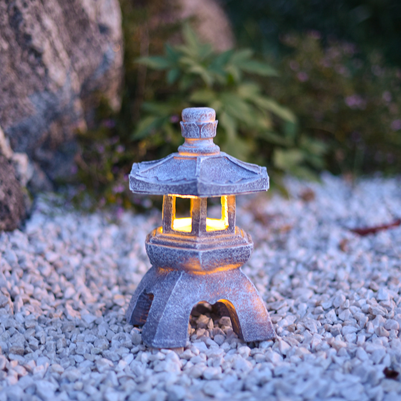 Outdoor solar-powered new Chinese-style palace lantern statue ornaments, outdoor Buddhist implements, Zen-inspired stone pagoda statues, resin handicrafts Application Scenario