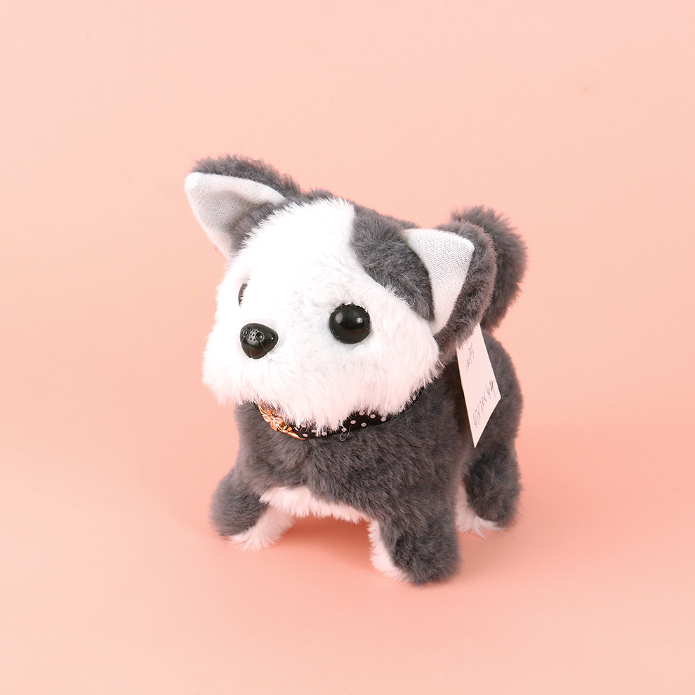 An electric plush dog with a collar, singing while posing, and playing cute while picking up toys for interaction
