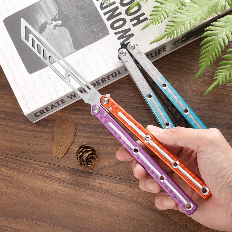 New sea monster folding butterfly knife, bright groove practice training knife, multi-functional hand-swinging fancy knife, squid without cutting edge details Picture