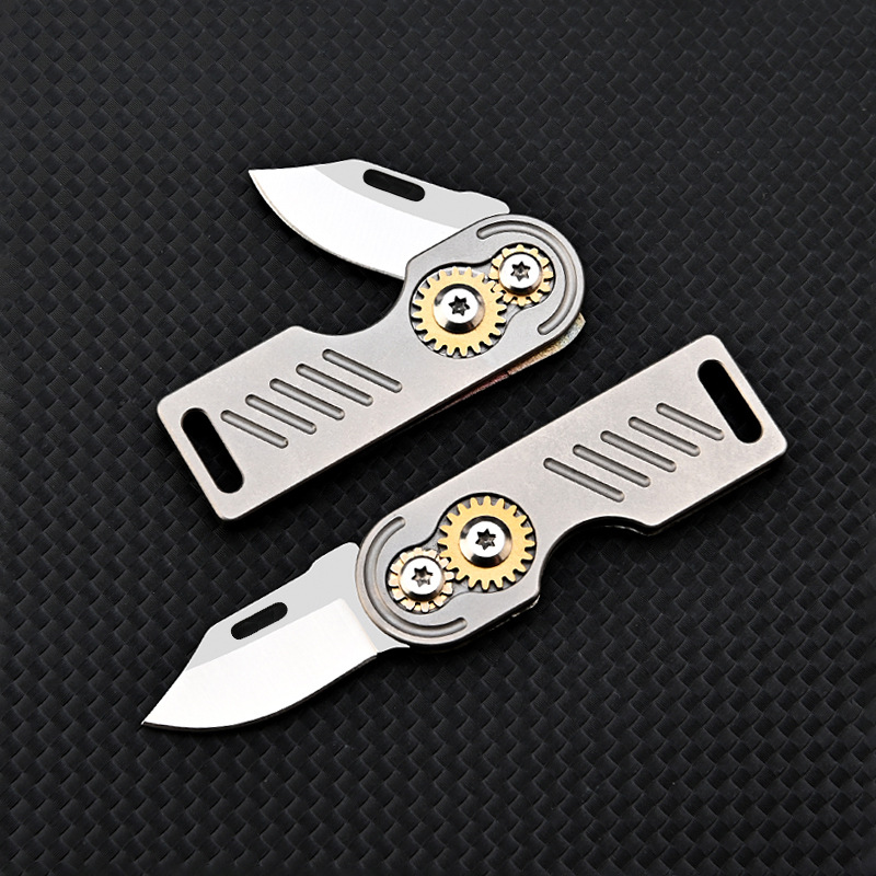 Titanium alloy gear knife, sharp and high-hardness D2 steel mini folding knife, portable keychain, portable unboxing and express delivery knife Application Scenario