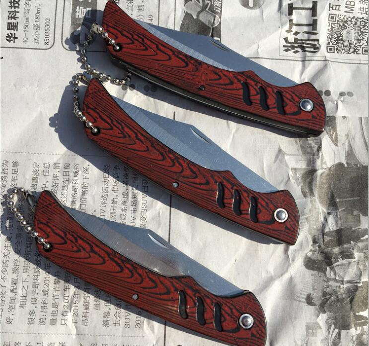 Wooden handle patterned folding knife, outdoor knife, daily necessities fruit knife, wholesale supply for one or two yuan, gift Application Scenario