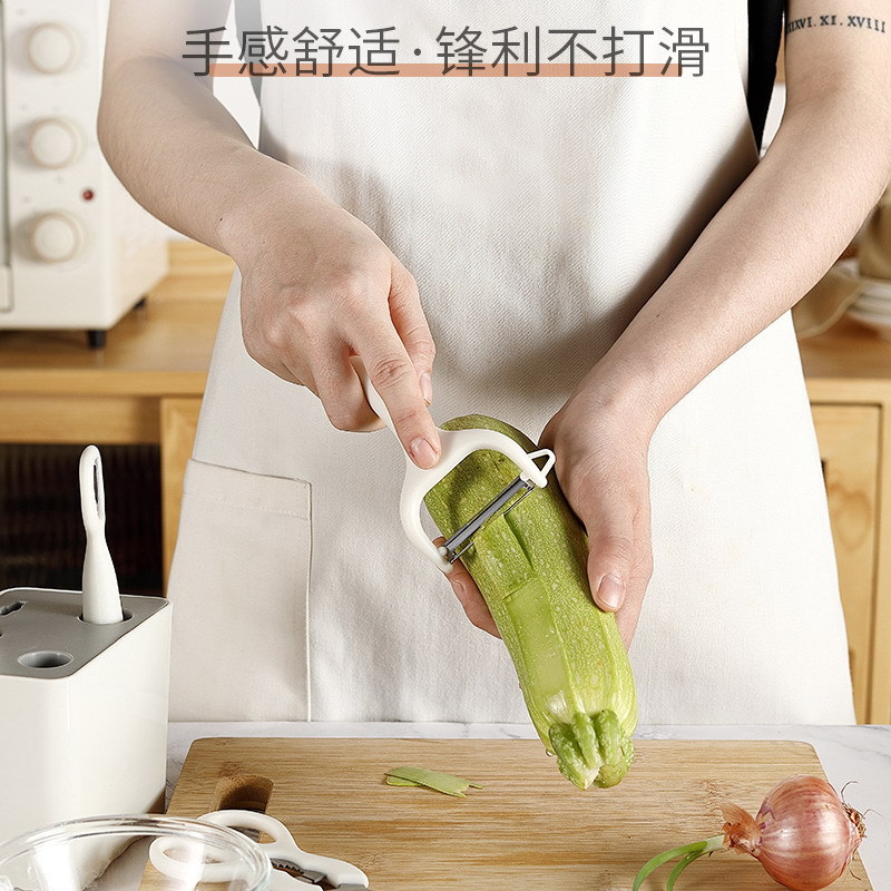 6-piece kitchen tool set: Fruit peeler set with storage stand, melon peeler, scissors, fruit knife, egg beater set details Picture