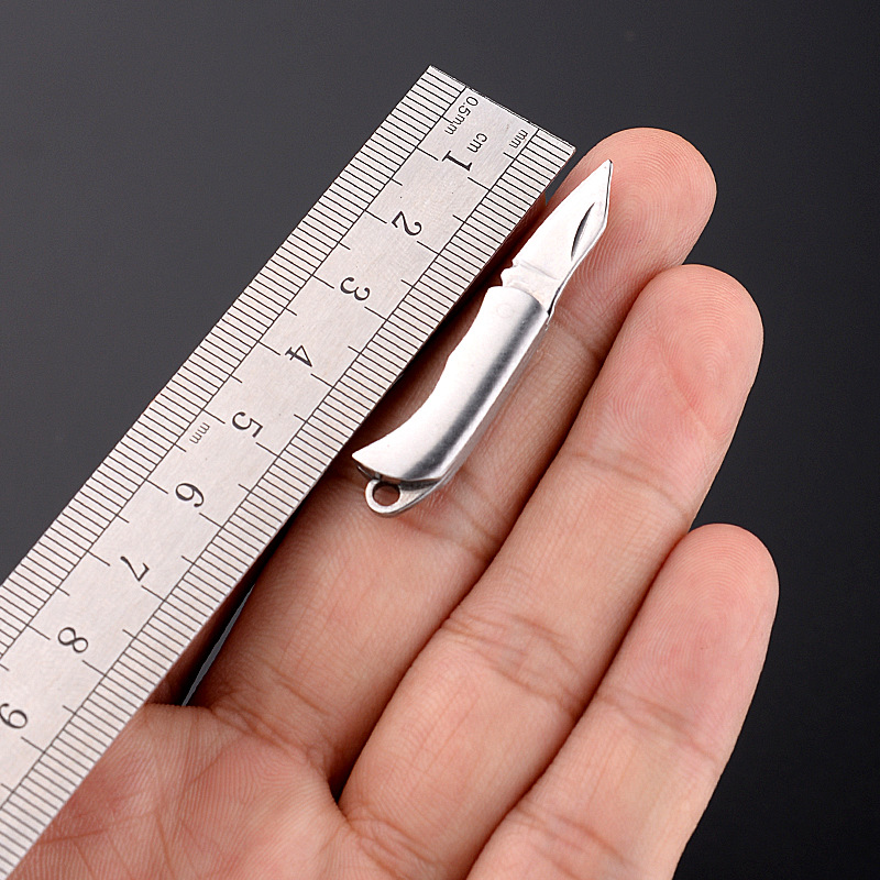 Mini folding knife, legal self-defense knife, exquisite brass knife, keychain, small knife for opening packages and boxes undefined