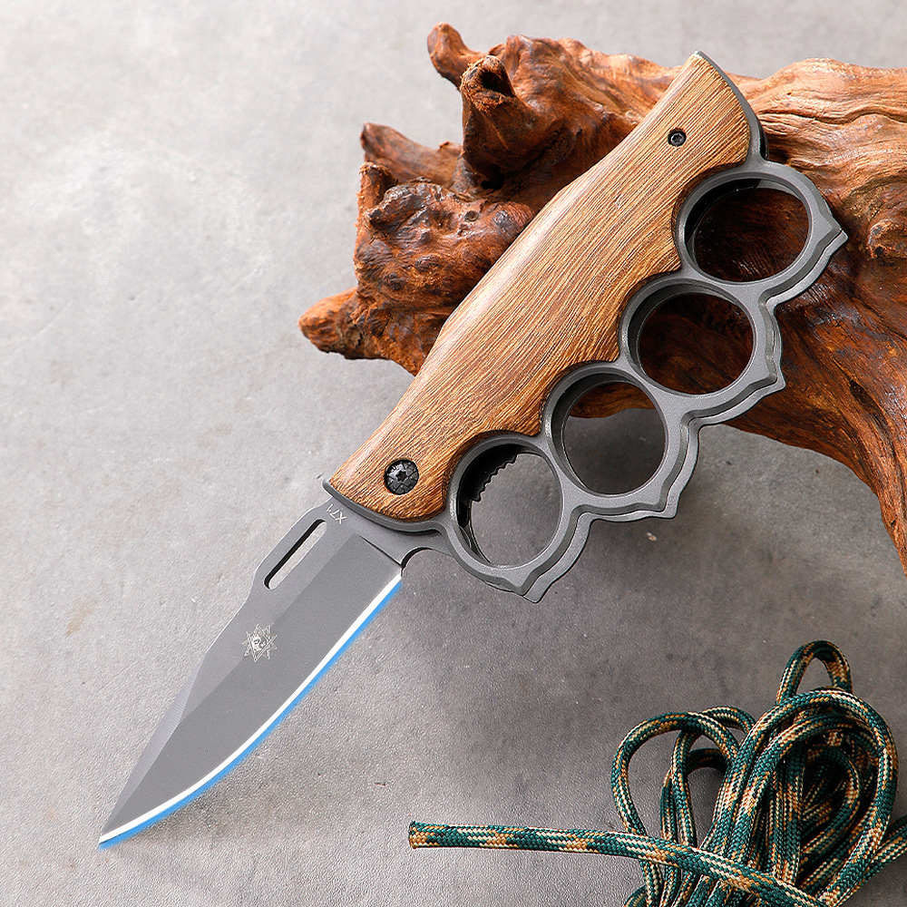 Yangjiang direct sales outdoor high-hardness folding boxing gloves knives, sharp camping fruit knives, car-mounted window-breaking survival knives Item Picture