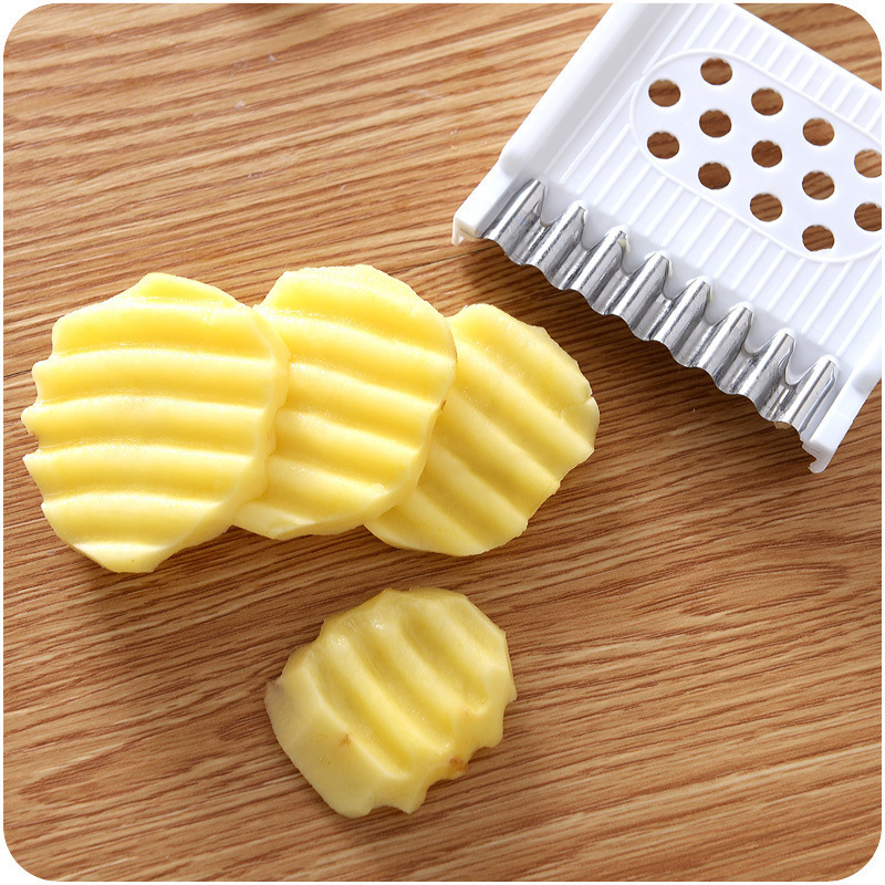 Stainless steel multi-functional vegetable cutter, household shredded potato cutter and grater, slicing, hand care, radish cleaning, kitchen wonder Application Scenario