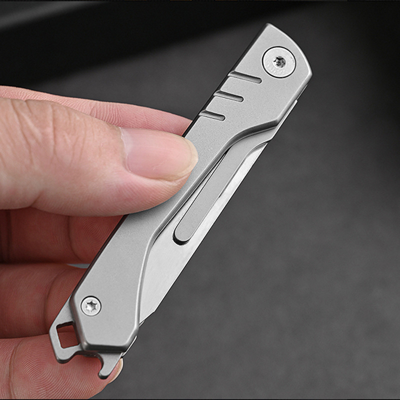 Wholesale stainless steel utility knives, folding surgical knives, small knives, mini portable sharp, express keychains, portable Application Scenario