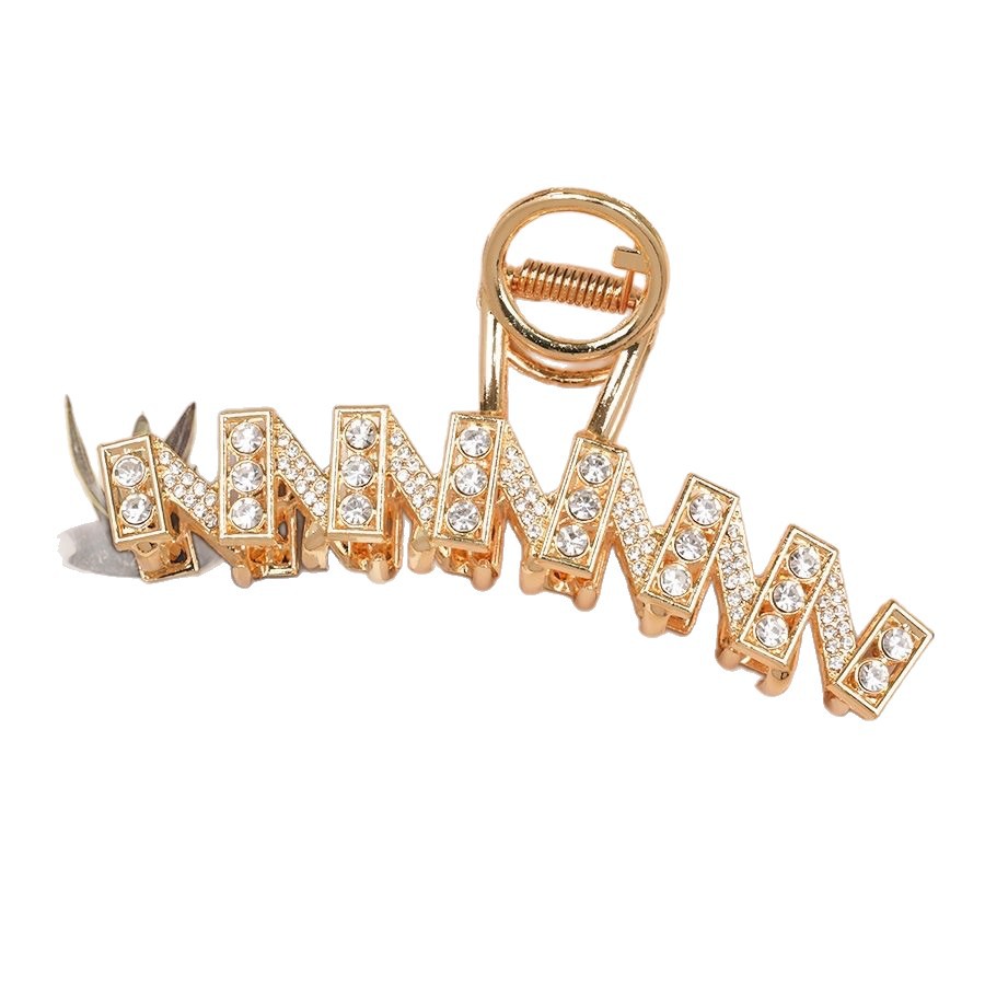 The Korean version of the water diamond letter hair clip is a niche design with a high-end feel. It features a full diamond N-shaped hair clip, a large hair volume, and a shark clip Item Picture