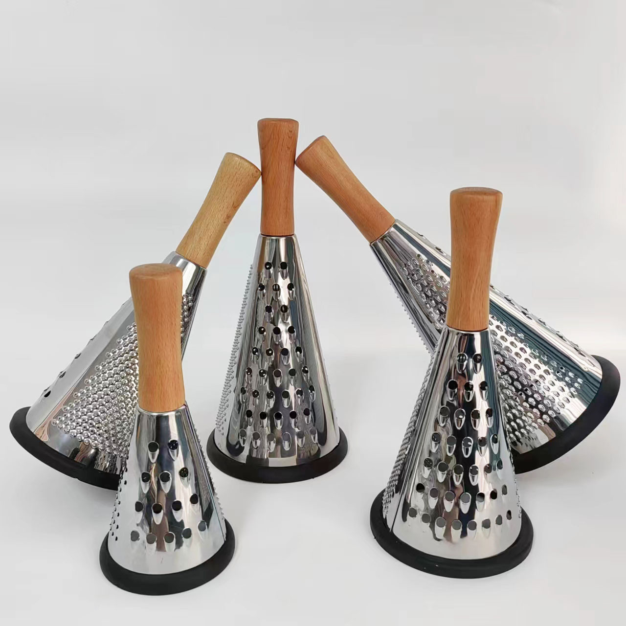 Multi-functional vegetable cutter, wooden handle grater, vertical stainless steel conical grater, three-sided grater, potato grater, cheese grater Application Scenario