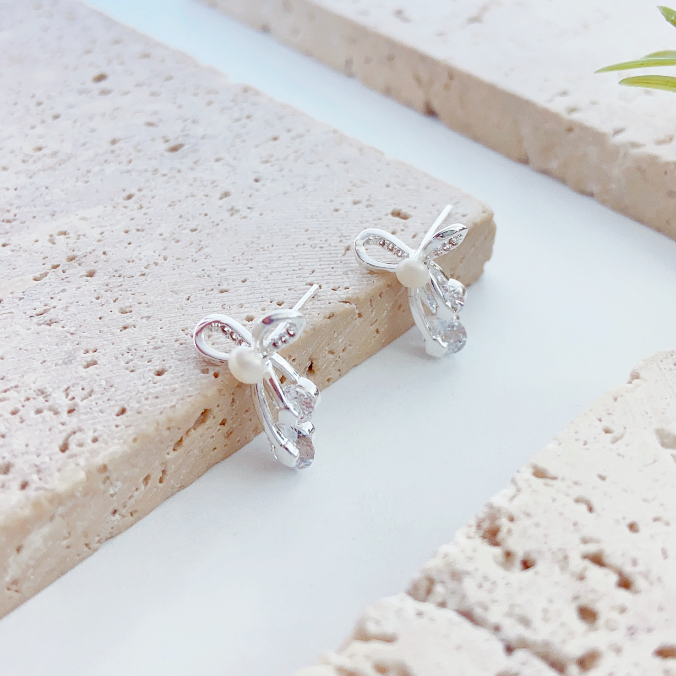 A pair of mini millet bead handcrafted pearl stud earrings s925 silver needle earrings are exquisite and small, suitable for ladies to wear daily Specification image