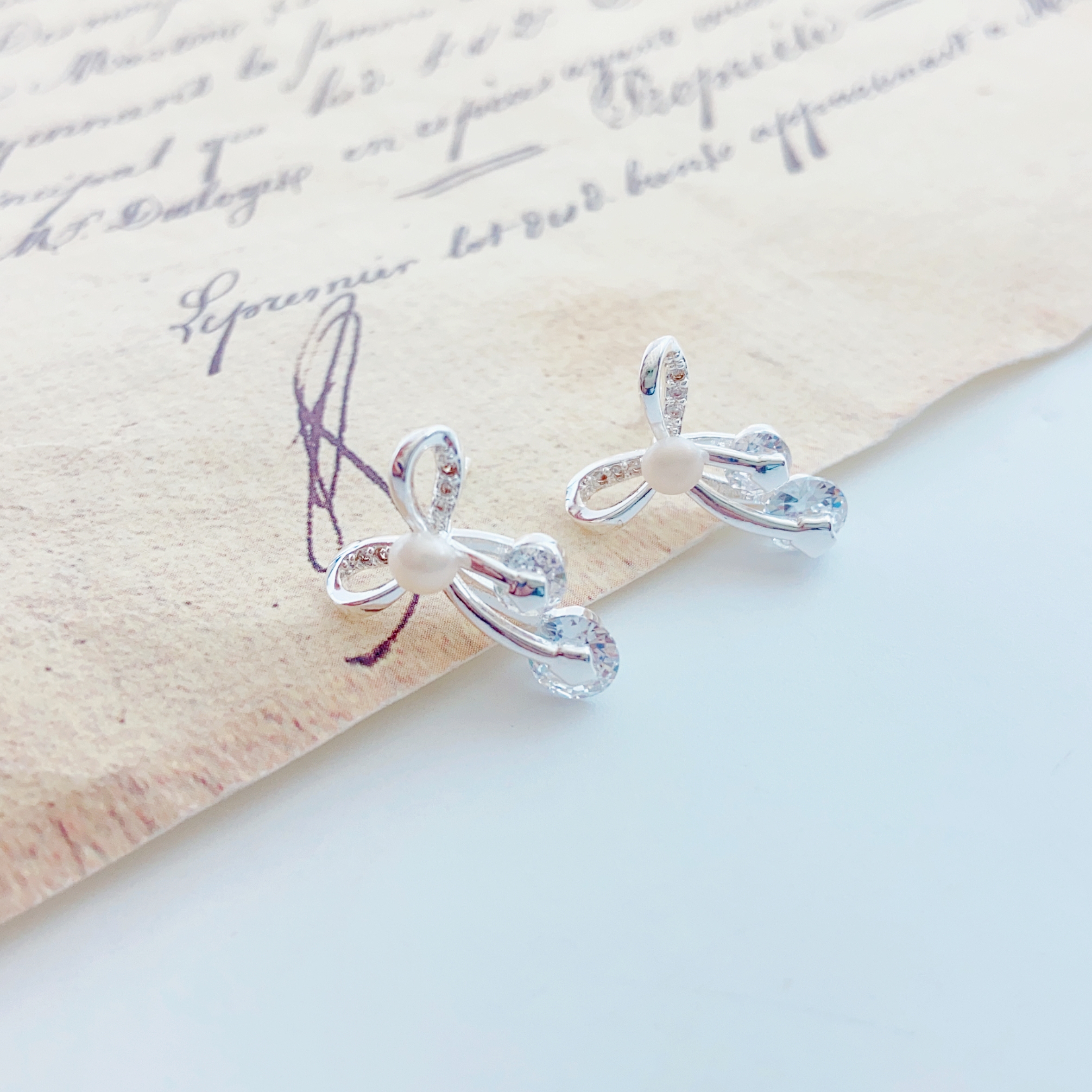 A pair of mini millet bead handcrafted pearl stud earrings s925 silver needle earrings are exquisite and small, suitable for ladies to wear daily Item Picture