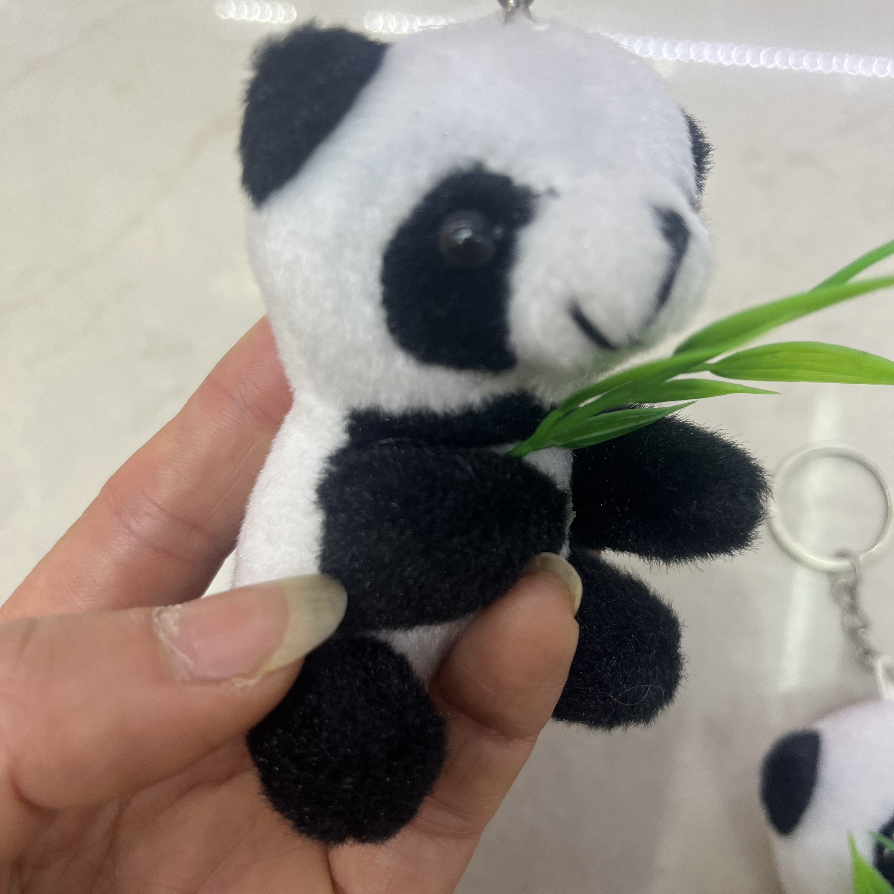 Plush toys, Hong Kong bear hugging bamboo, panda Chengdu souvenir, panda creative doll, cartoon peripheral pendants, plush toy pendants, keychain, cloth doll pendants, cute decorative gifts, claw machine factory direct sales Application Scenario