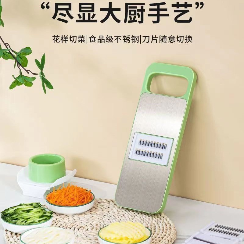 A multi-functional stainless steel panel vegetable slicer for the kitchen, a perfect tool for peeling potatoes, garlic and carrot shreds, scraping and slicing Application Scenario