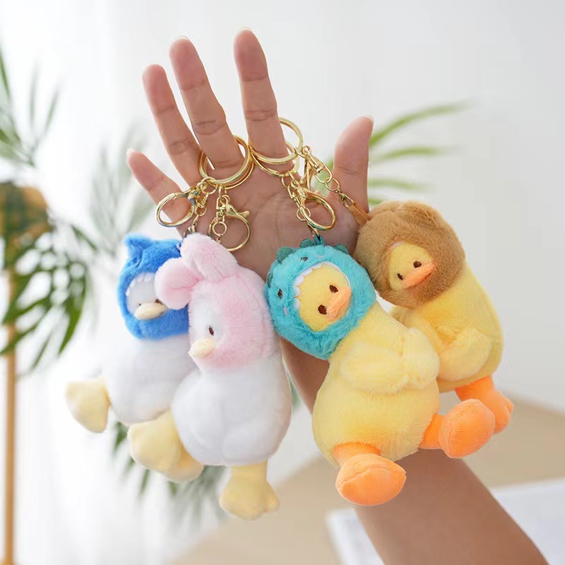 Tilt-headed duck wearing a hat, creative duck doll, cartoon peripheral pendant, plush toy pendant, keychain, cloth doll pendant, cute decoration gift, claw machine factory direct sales