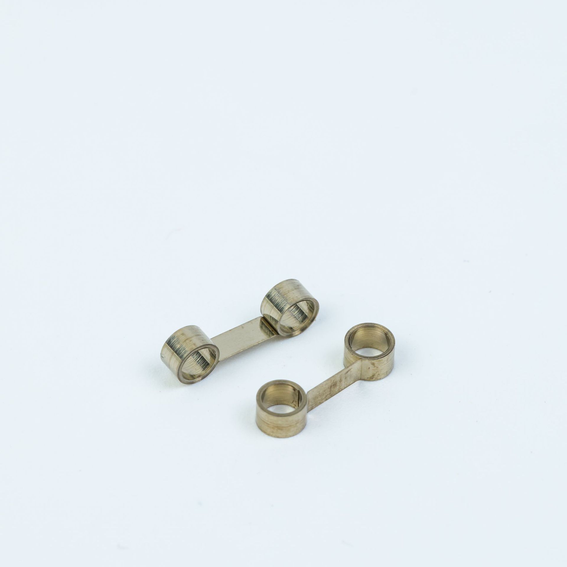 Manufacturer's stainless steel constant force spring TS5 carbon brush spring double-eye spring non-standard special-shaped parts can be customized according to your drawings Application Scenario