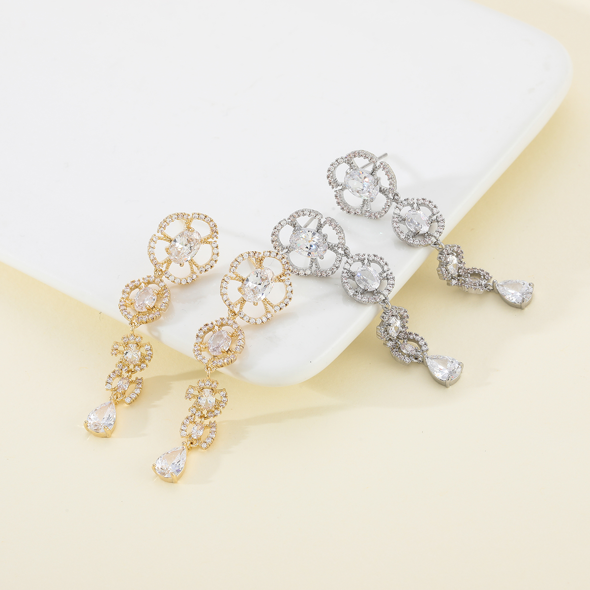 Xuhui brand exquisite and light luxury copper plated with real gold and zircon inlaid 925 silver needle luxurious camellia fashionable and elegant stud earrings Item Picture